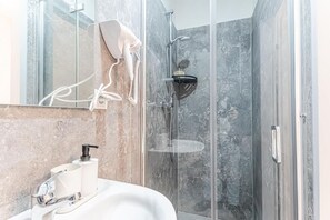 Shower, hair dryer, shampoo