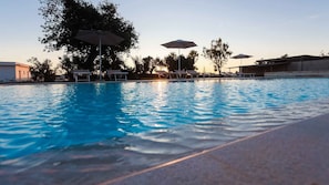 Seasonal outdoor pool, pool umbrellas, pool loungers