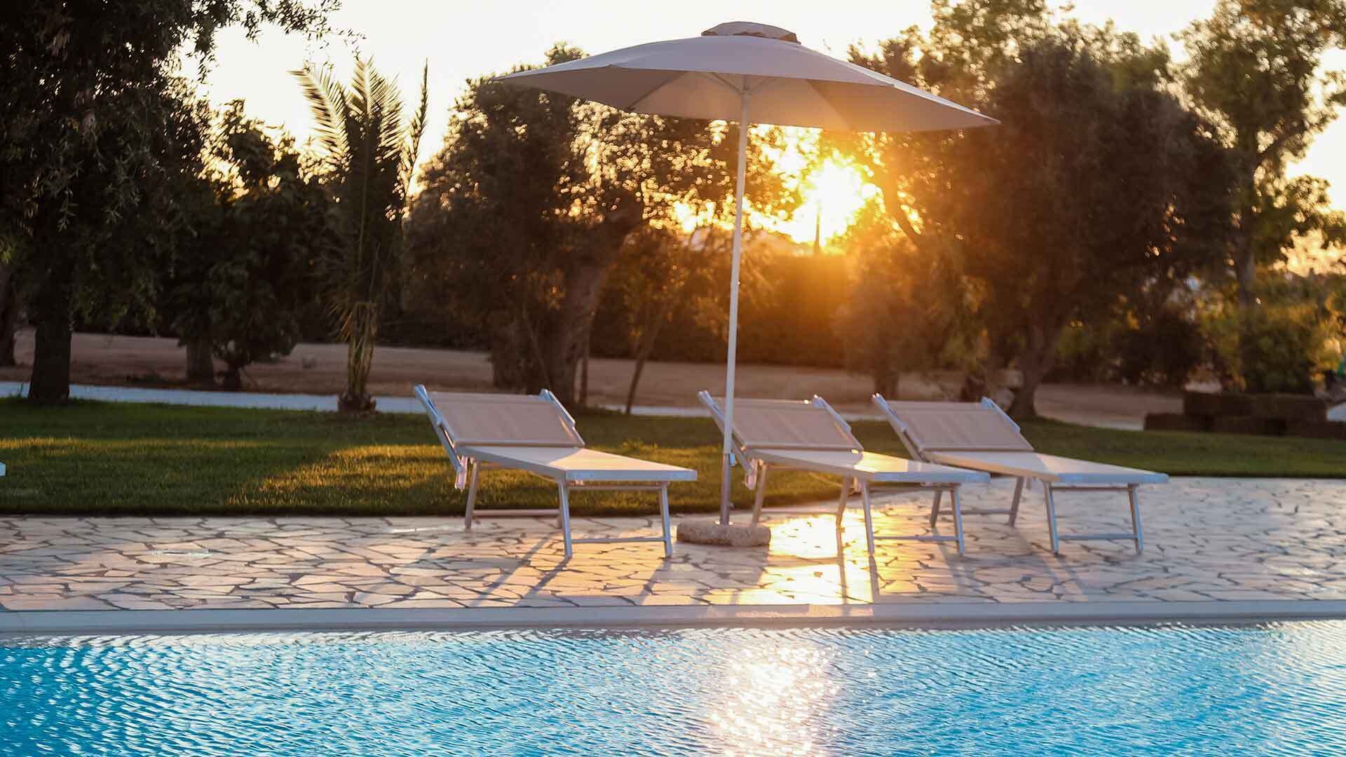 Seasonal outdoor pool, pool umbrellas, sun loungers