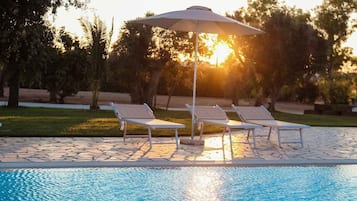 Seasonal outdoor pool, pool umbrellas, sun loungers