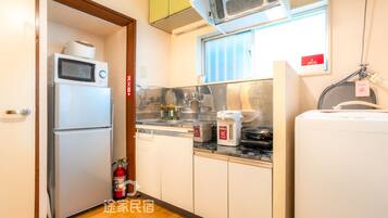 Fridge, microwave, electric kettle, cookware/dishes/utensils
