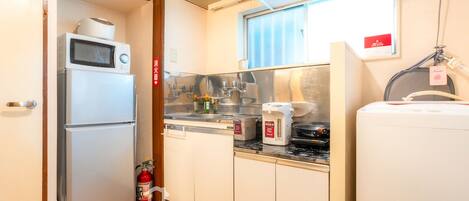 Fridge, microwave, electric kettle, cookware/dishes/utensils