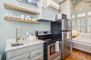 Fridge, microwave, coffee/tea maker, toaster