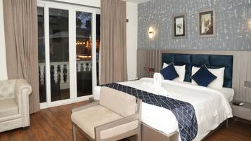 Suite, 2 Double Beds, Balcony, Pool View | Premium bedding, down comforters, memory foam beds, minibar