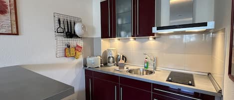 Fridge, microwave, cookware/dishes/utensils