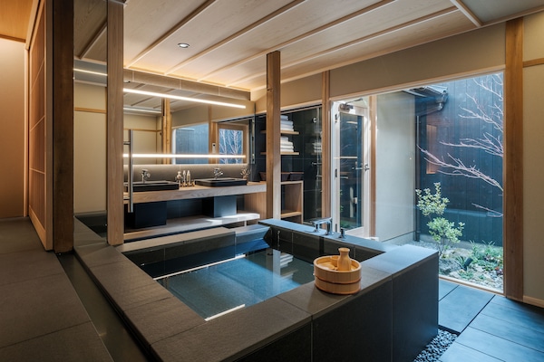Luxury House | Bathroom | Separate tub and shower, deep soaking tub, rainfall showerhead