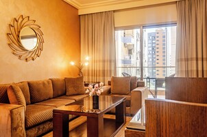 Presidential Suite | Living area | 125-inch LCD TV with premium TV channels