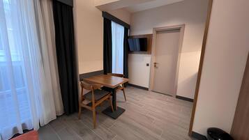 Executive Triple Room, City View | Minibar, desk, soundproofing, free WiFi