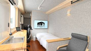 Desk, laptop workspace, blackout curtains, iron/ironing board