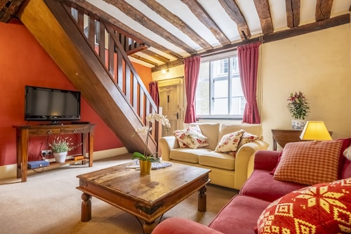 Medieval house with wonky beams and sloping wooden - Duke's Lodge