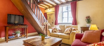 Medieval house with wonky beams and sloping wooden - Duke's Lodge