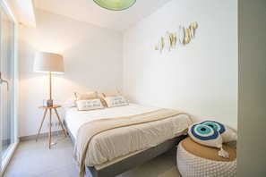 2 bedrooms, in-room safe, iron/ironing board, travel cot