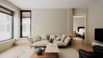 Premium Apartment | Living area | Flat-screen TV