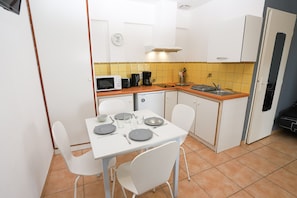 Fridge, microwave, coffee/tea maker, electric kettle