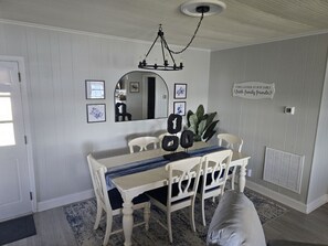 Dining - Waterfront with private dock, Hot tub, & swim mat. Large fenced backyard and screened in porch for relaxing. (Cedar Point)