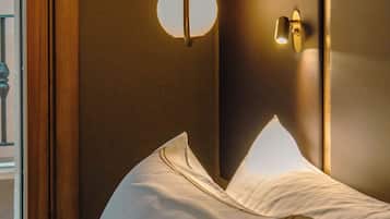 Egyptian cotton sheets, premium bedding, down comforters, in-room safe