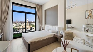 1 bedroom, desk, iron/ironing board, travel crib - Modern Studio in residence with pool gym and paddl (Dubai)