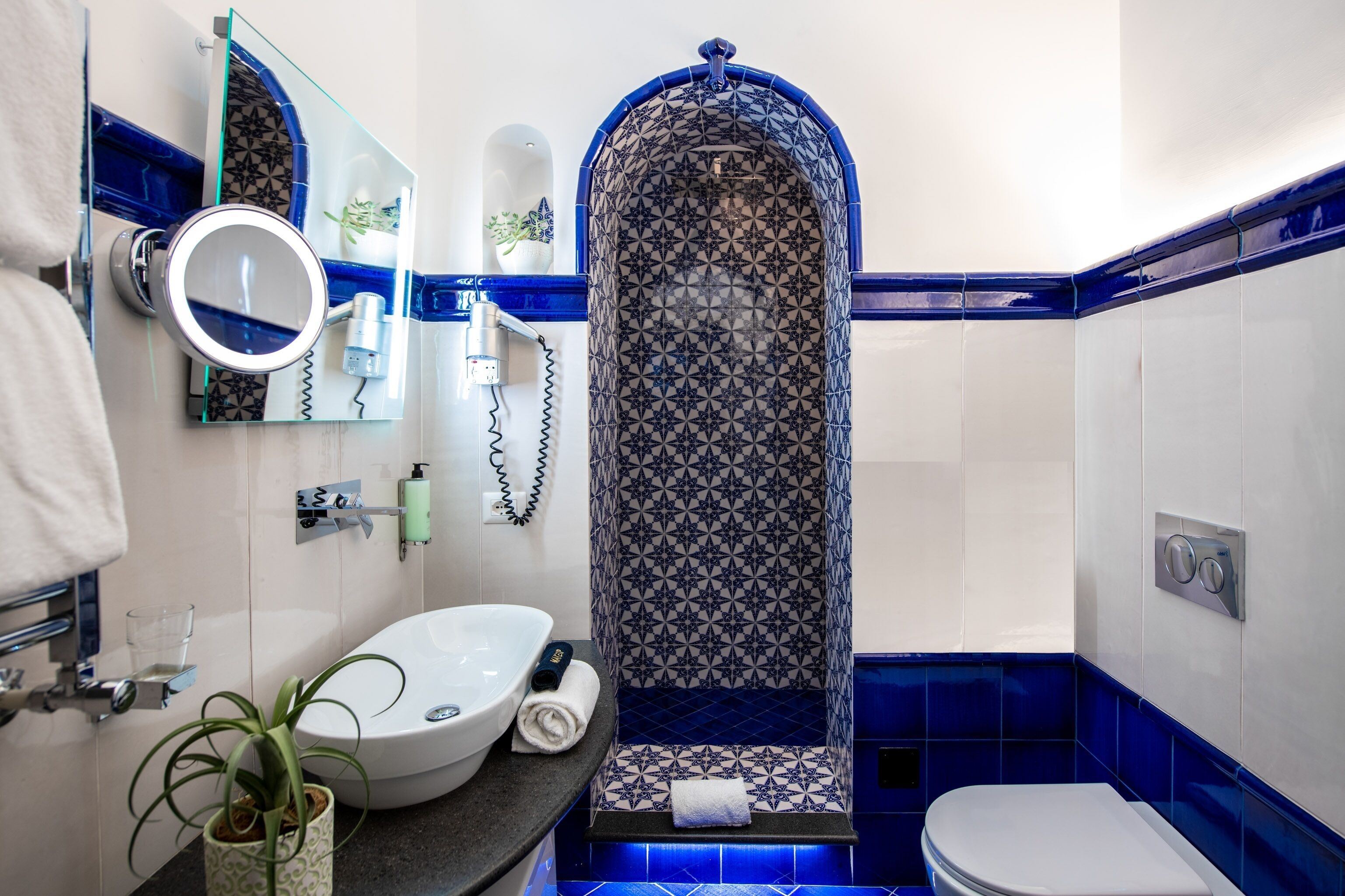 Shower, eco-friendly toiletries, hair dryer, bidet