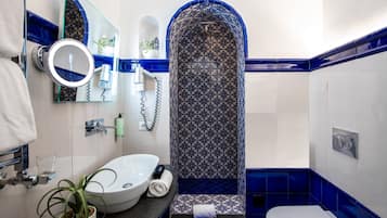 Shower, eco-friendly toiletries, hair dryer, bidet