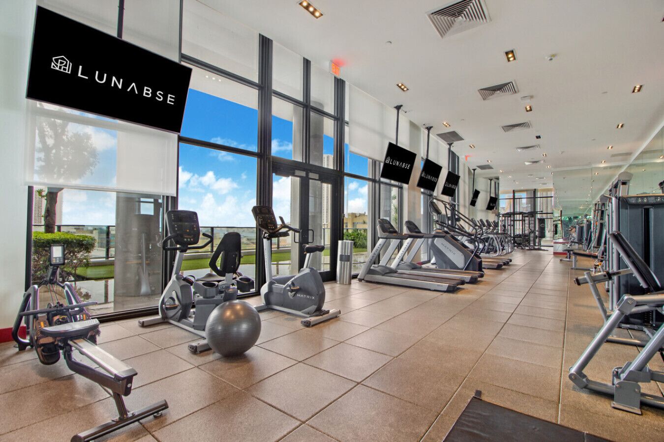 Lunabase ☾ Remote Life Dream | Smart Condo, Spacious Lounge Patio, Book Haven, Workspace, Parking