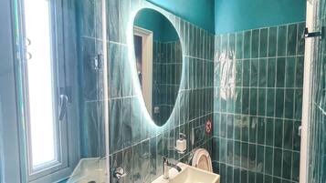 Hair dryer, towels, soap, toilet paper