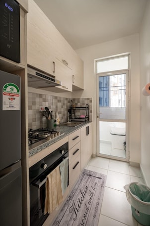 Apartment | Private kitchen | Fridge, microwave, oven, stovetop