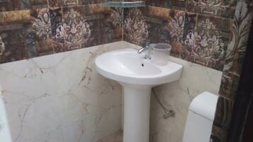 Premium Double Room, City View | Bathroom | Shower, rainfall showerhead, towels, soap