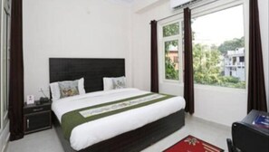 Premium Double Room, City View | Desk, bed sheets