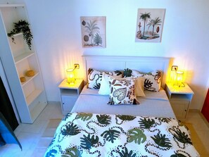 2 dormitorios, tabla de planchar con plancha, wifi y ropa de cama