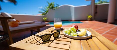 Outdoor pool, pool umbrellas, pool loungers