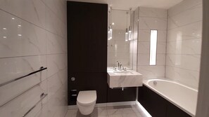 Apartment | Bathroom | Separate tub and shower, deep soaking tub, hair dryer, towels