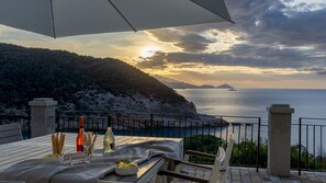 A table set for two with a view of the sea and mountains. - Villa Meraviglia 8, Emma Villas (Nisporto)