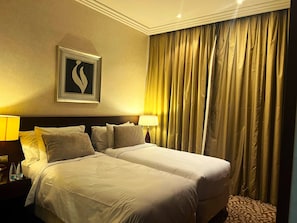 Suite exécutive | Draps italiens de Frette, literie de qualité, couette en duvet