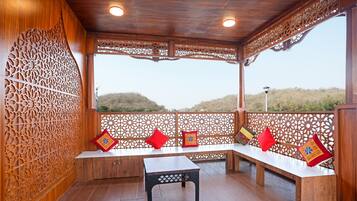 Classic Room | Living area | 32-inch flat-screen TV with cable channels