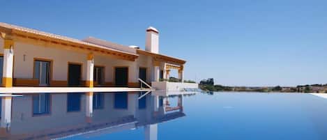 2 outdoor pools, pool umbrellas, sun loungers