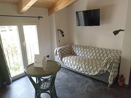 Habitación Confort doble | Edredones de plumas, colchones viscoelásticos, caja fuerte y escritorio