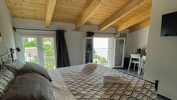 Chambre Double Supérieure | Couette en duvet d'oie, matelas mémoire de forme