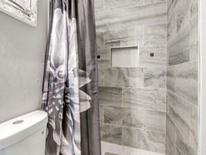 Shower, towels, soap, toilet paper