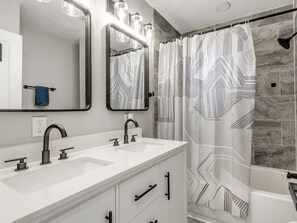 Shower, towels, soap, toilet paper - Experience convenience and comfort in this cozy fully updated modern home! (Oklahoma City)