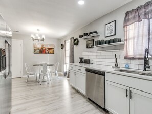 Fridge, microwave, oven, stovetop - Experience convenience and comfort in this cozy fully updated modern home! (Oklahoma City)