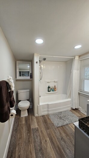 Hair dryer, towels, soap, shampoo