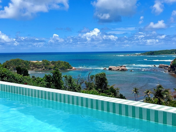 Outdoor pool - Sea Cliff Eco-Cottages & Gin Distillery (Calibishie)