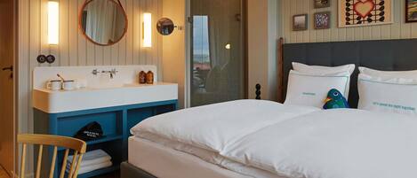 Premium bedding, free minibar, in-room safe, individually decorated