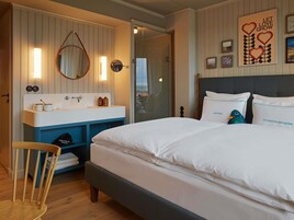 Premium bedding, free minibar, in-room safe, individually decorated