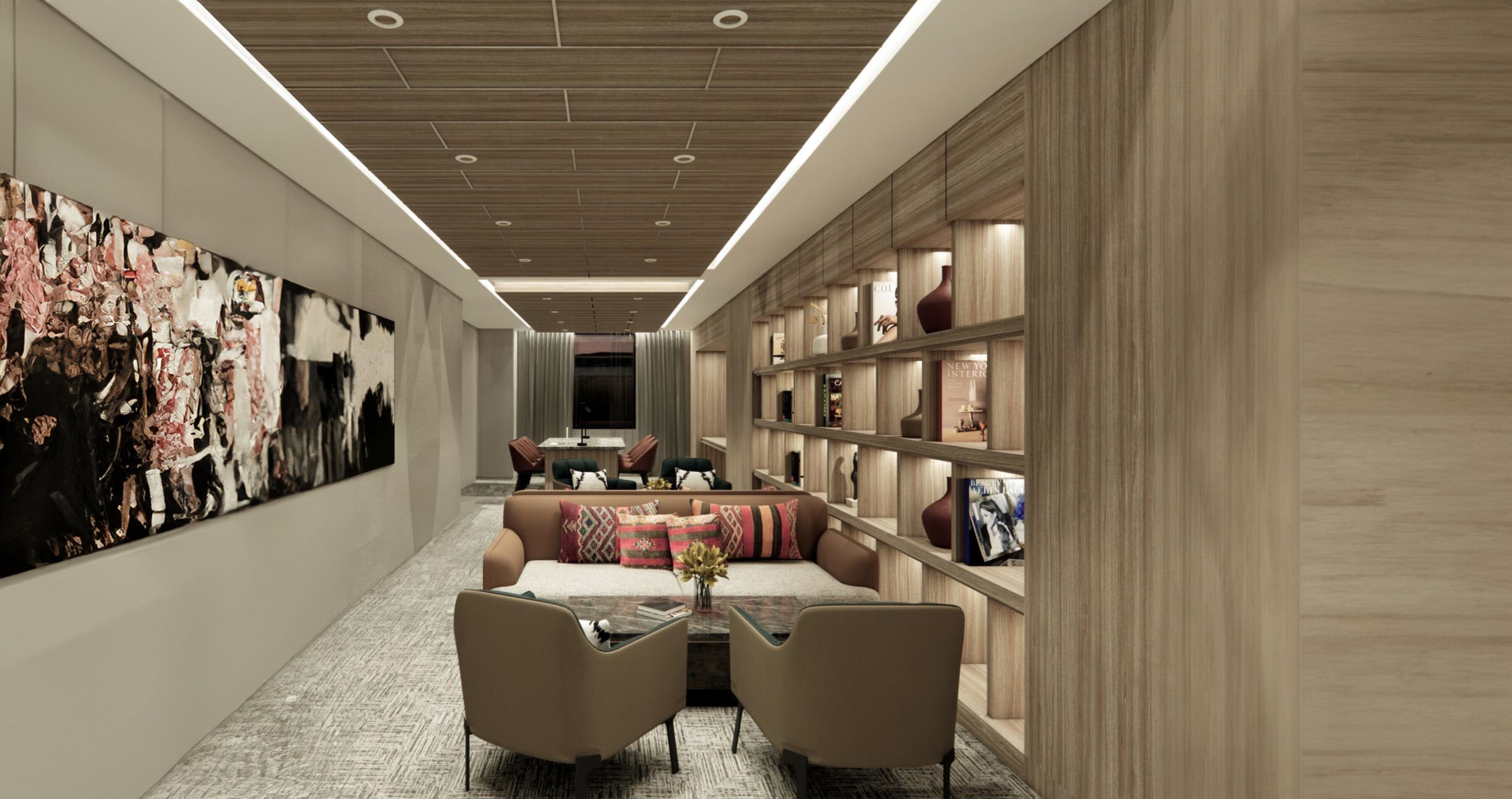 A modern interior with a long hallway, a seating area with a sofa and chairs, and a bookshelf with decorative items.