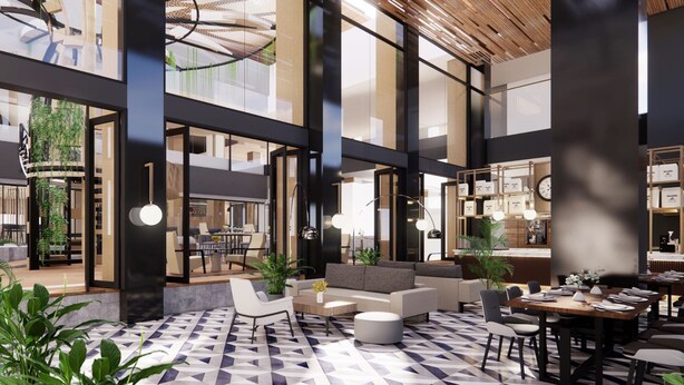 A spacious lobby with a high ceiling, modern furniture, and a geometric patterned floor. - Mövenpick Hotel Jakarta City Centre (Jakarta)