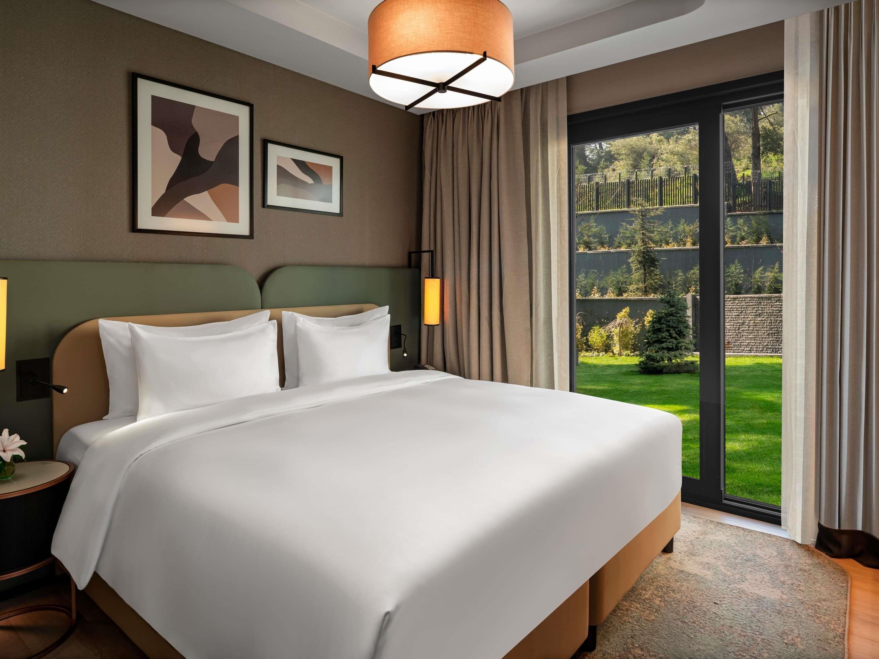 Premium bedding, down duvets, in-room safe, individually decorated