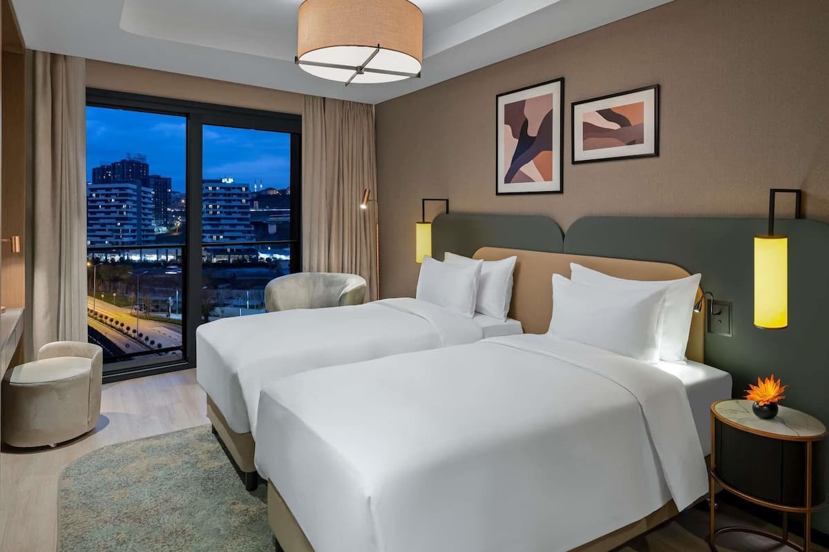 Premium bedding, down comforters, in-room safe, desk