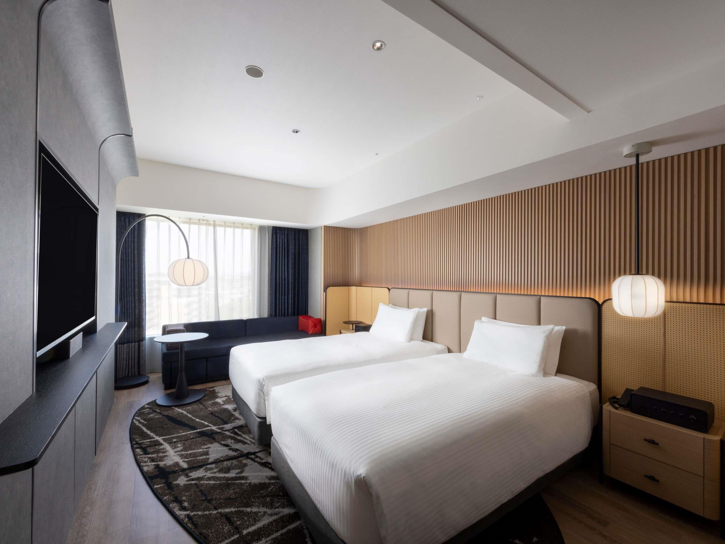 Executive suite, 2 eenpersoonsbedden, niet-roken, toegang tot de clublounge | Hypoallergeen beddengoed, een kluis op de kamer