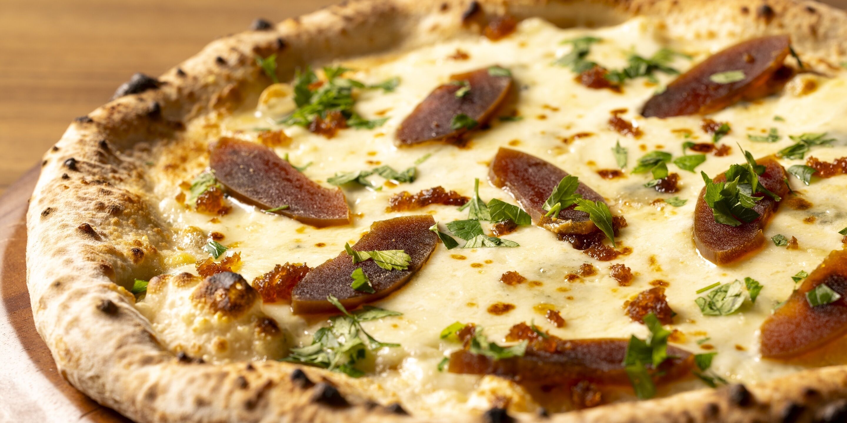 A pizza with toppings.